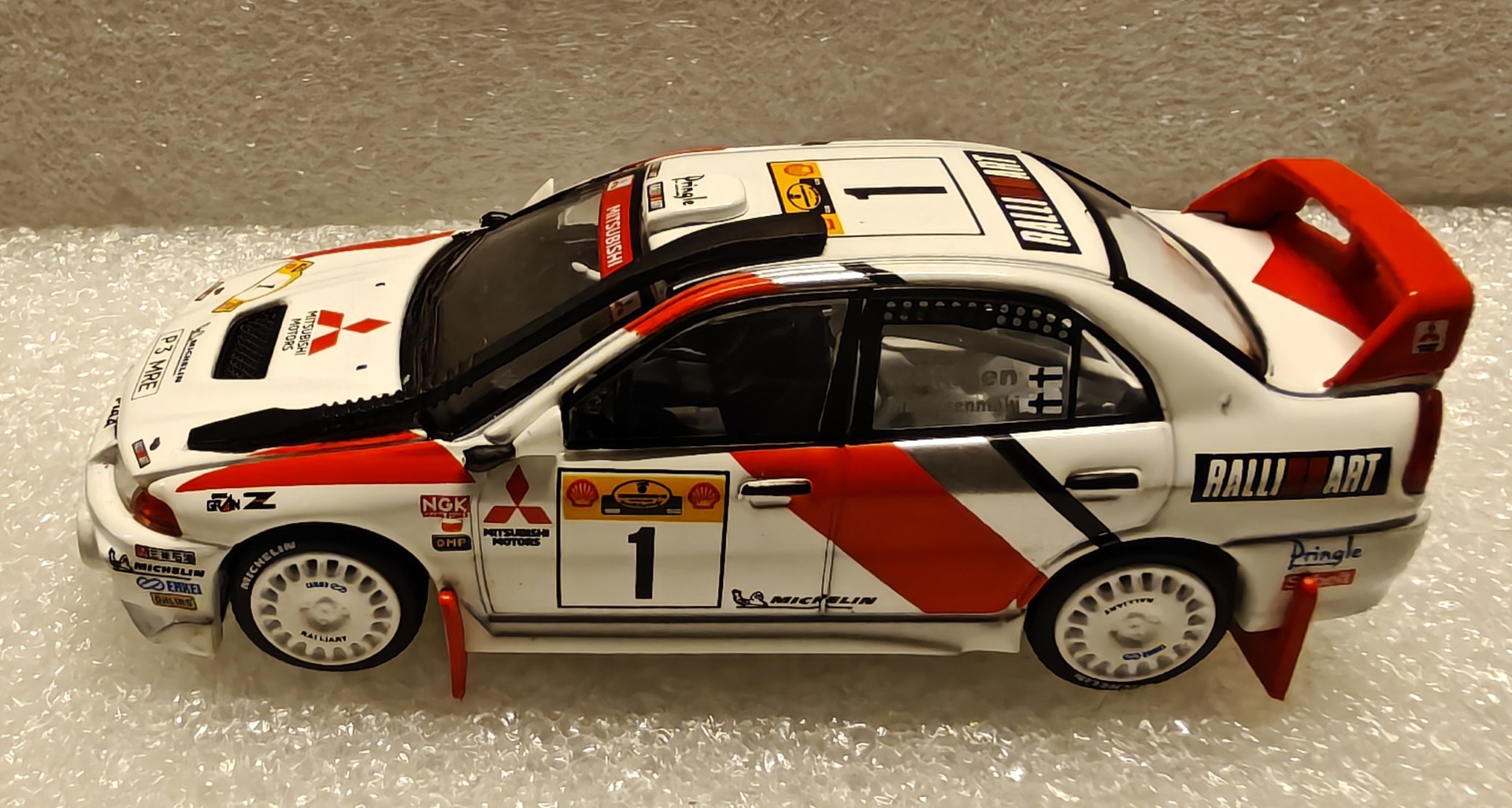 Pienoismalli Mitsubishi Lancer Evo IV Safari 1998 1/64